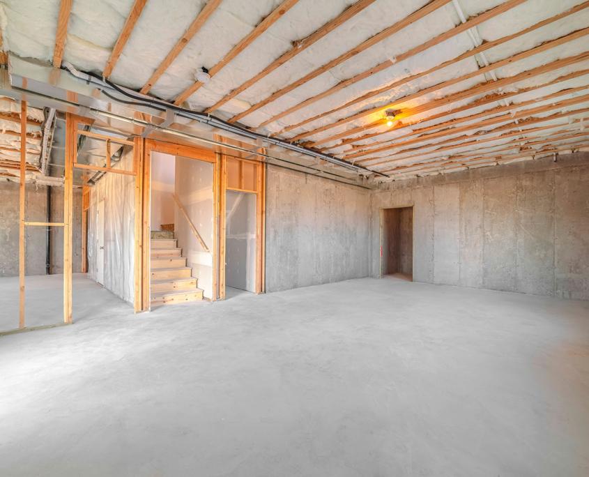 Expertly poured basement interior in new home room construction by Baltimore Concrete Pros in the Ellicott CIty, Fulton, Lutherville, Columbia, Ilchester, Scaggsville, Towson, Timonium, North Laurel, Mays Chapel areas.