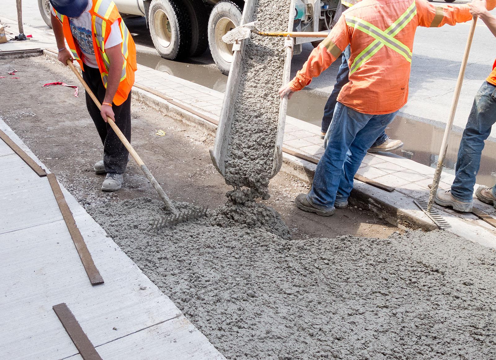 Baltimore Concrete Pros pouring cement during upgrade of sidewalk in commercial area of Ellicott CIty, Fulton, Lutherville, Columbia, Ilchester, Scaggsville, Towson, Timonium, North Laurel, Mays Chapel and surrounding.
