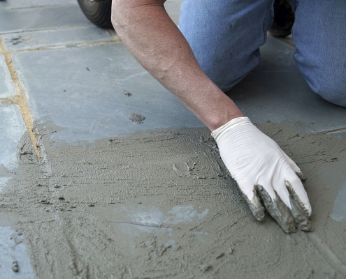 Concrete professional performing concrete repair services in Baltimore.